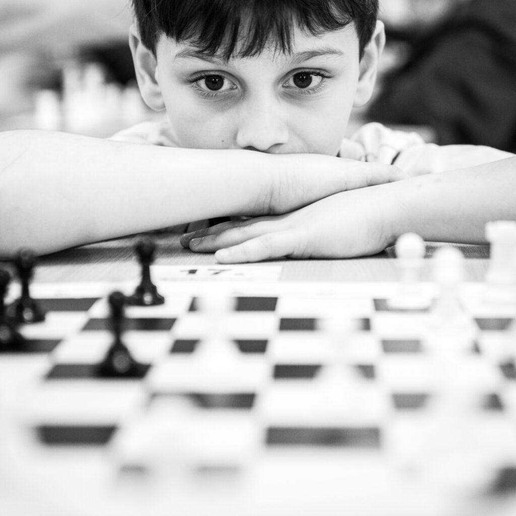 child attending online chess lesson showing importance of guided learning